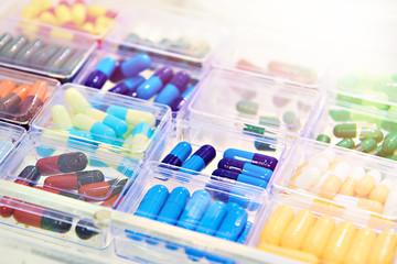 Soluble drug pills in plastic box