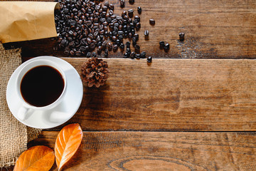 Coffee cups and roasted coffee beans
