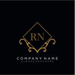 RN Initial logo. Ornament ampersand monogram golden logo