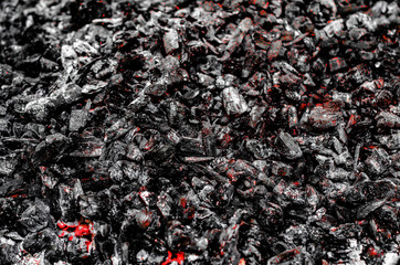 Ashes, black embers. Background of a burnt fire bonfire