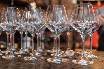 Wine glasses standing on a counter