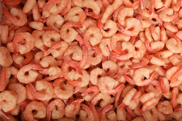 Fresh raw shrimps as background, top view. Wholesale market