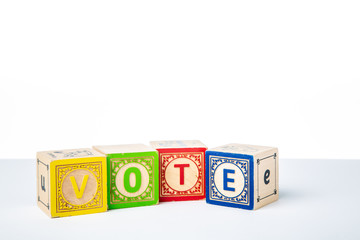 Childrens Wooden Alphabet Blocks Spelling the Word Vote © monitor6