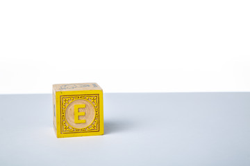 Childrens Wooden Alphabet Block Showing the Letter E