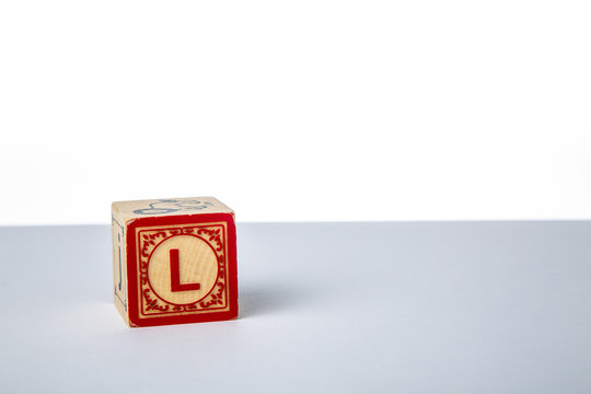 Childrens Wooden Alphabet Block Showing the Letter L