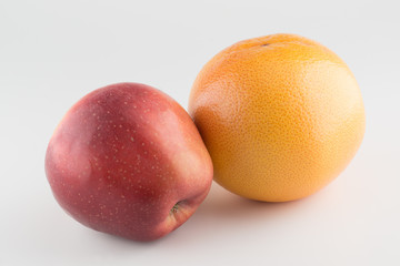Apples and Orange Isolated on a White Background