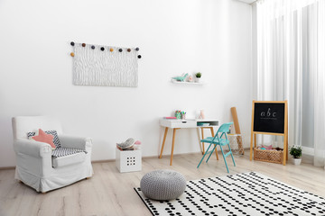 Fototapeta premium Modern child room interior with stylish furniture