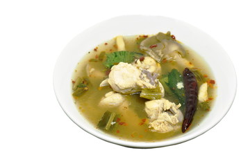 spicy boiled chicken with straw mushroom Tom Yum Soup on bowl