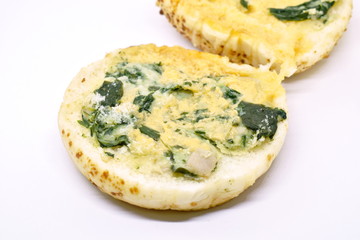 whole wheat cheese burger with slice ham and spinach on white background
