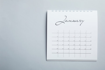 January calendar on light grey background, top view. Space for text