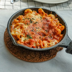 Baked creamy, mac and cheese with minced meat, italian ground beef bolognese casserole