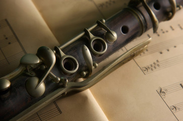 Obraz premium clarinet with sheet music in the background