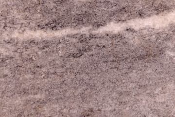 brown polished ural stone in the wall