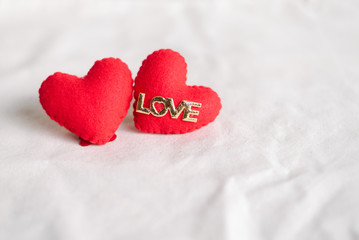 Love hearts on cotton texture background. Valentines day card concept. Heart for Valentines Day Background.