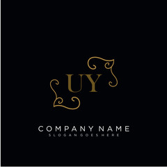 Fototapeta na wymiar Initial letter UY logo luxury vector mark, gold color elegant classical