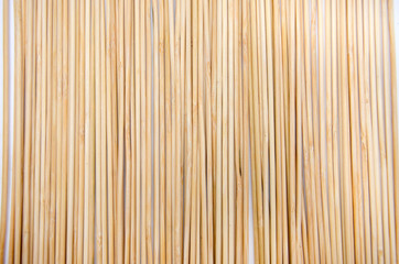 wooden skewers, background. Close-up. View from above.