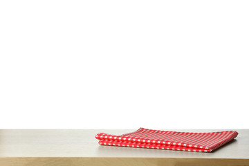 Folded kitchen towel on wooden table. Space for design