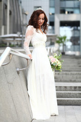 Beautiful bride in white dress with crown