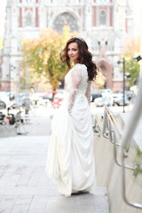 Beautiful bride in white dress with crown