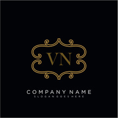 Initial letter VN logo luxury vector mark, gold color elegant classical 