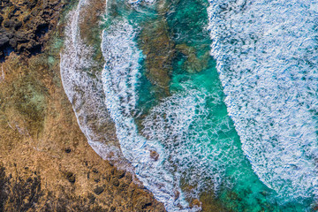 Fototapeta premium Fuerteventura. Vulcano Beach. Waves. Top View of a drone at the Bay. Spain