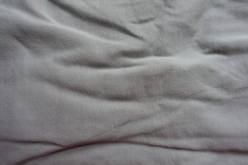 Texture of jammed light grey cotton fabric
