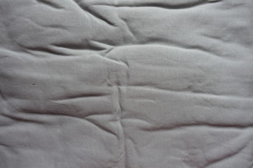 Top view of simple jammed grey cotton fabric