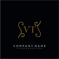 Initial letter VT logo luxury vector mark, gold color elegant classical 