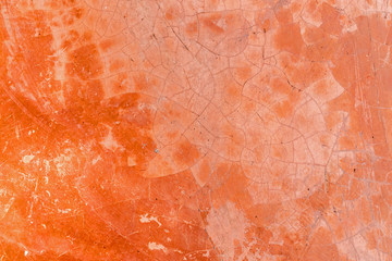 texture background of red cement floor, red cement wall surface, cracked pattern of cement floor
