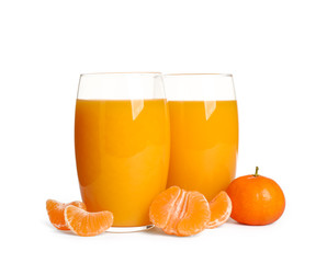 Fresh tangerines and glasses of juice isolated on white