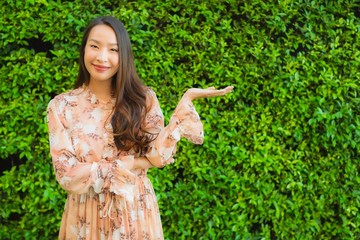 Portrait beautiful young asian women happy smile around outdoor