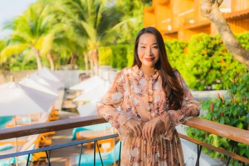 Portrait beautiful young asian women happy smile around outdoorn happy smile relax around tropical beach sea