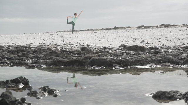 Woman doing yoga.