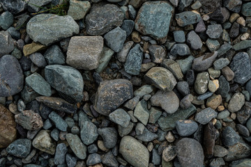 The texture of a shallow river stone. Pebble Background Image