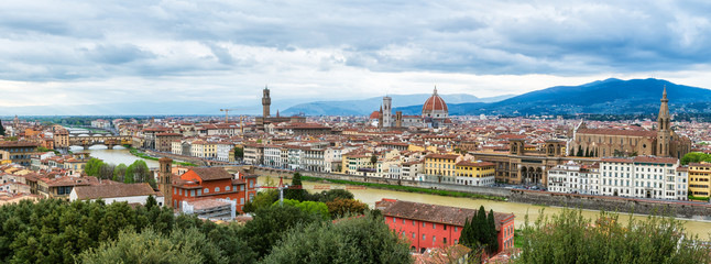 Amazing panoramic view of Florence city, Italy with the river Arno, Ponte Vecchio, Palazzo Vecchio, Cathedral of Santa Maria del Fiore and Basilica of Santa Croce.