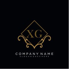 Initial letter XG logo luxury vector mark, gold color elegant classical 
