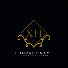 Initial letter XH logo luxury vector mark, gold color elegant classical 