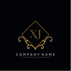 Fototapeta premium Initial letter XJ logo luxury vector mark, gold color elegant classical 