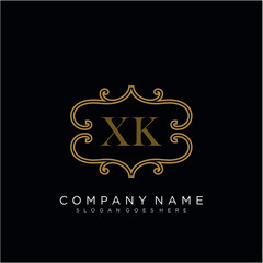 Initial letter XK logo luxury vector mark, gold color elegant classical 