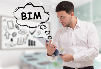 Business, technology, internet and network concept. The young businessman comes to mind the keyword: BIM