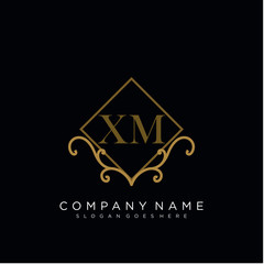 Initial letter XM logo luxury vector mark, gold color elegant classical 