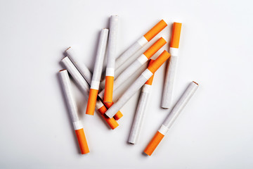 Close up of a smoking cigarettes . cigarette filter tubes