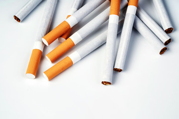 Close up of a smoking cigarettes . cigarette filter tubes
