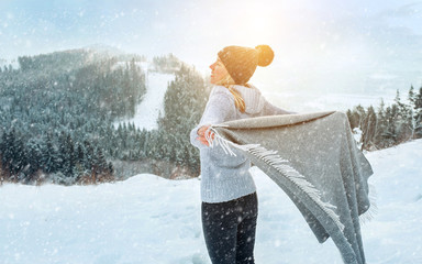 Portrait Happy woman traveler on the snowy of mountain look on t