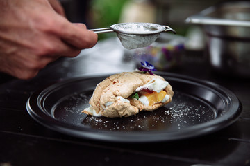 Meringue roulade with cream. 