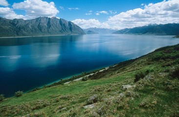 Fototapeta na wymiar Water reservoir in mountain landscape