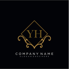 Initial letter YH logo luxury vector mark, gold color elegant classical 