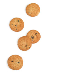 Tasty homemade cookies with raisins on white background, top view