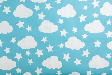 Blue sky painted on wall. Idea for baby room interior