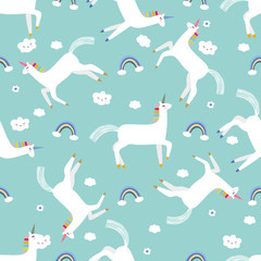Unicorns and rainbows seamless pattern, nursery background.